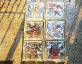 Collectible 6 glass blocks with MacDonald painting