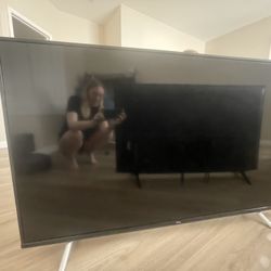 Two TLC Roku 55” 4k TVs w/ Stand And Wall Mount