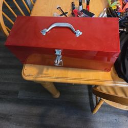 Red Tool Box With Tools And Gun Clean Kit