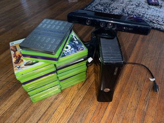 Black Xbox 360 with camera