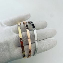 Cartier Signature Cuff Bracelet — Timeless Precision in Gold, Rose, and Silver