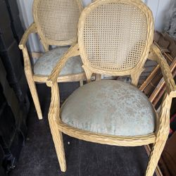 Pair of vintage cane back faux bois chairs.
