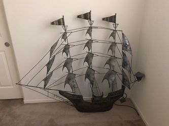 Huge metal ship sculpture