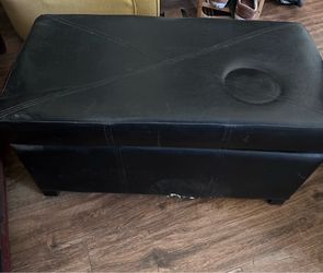 Black storage ottoman
