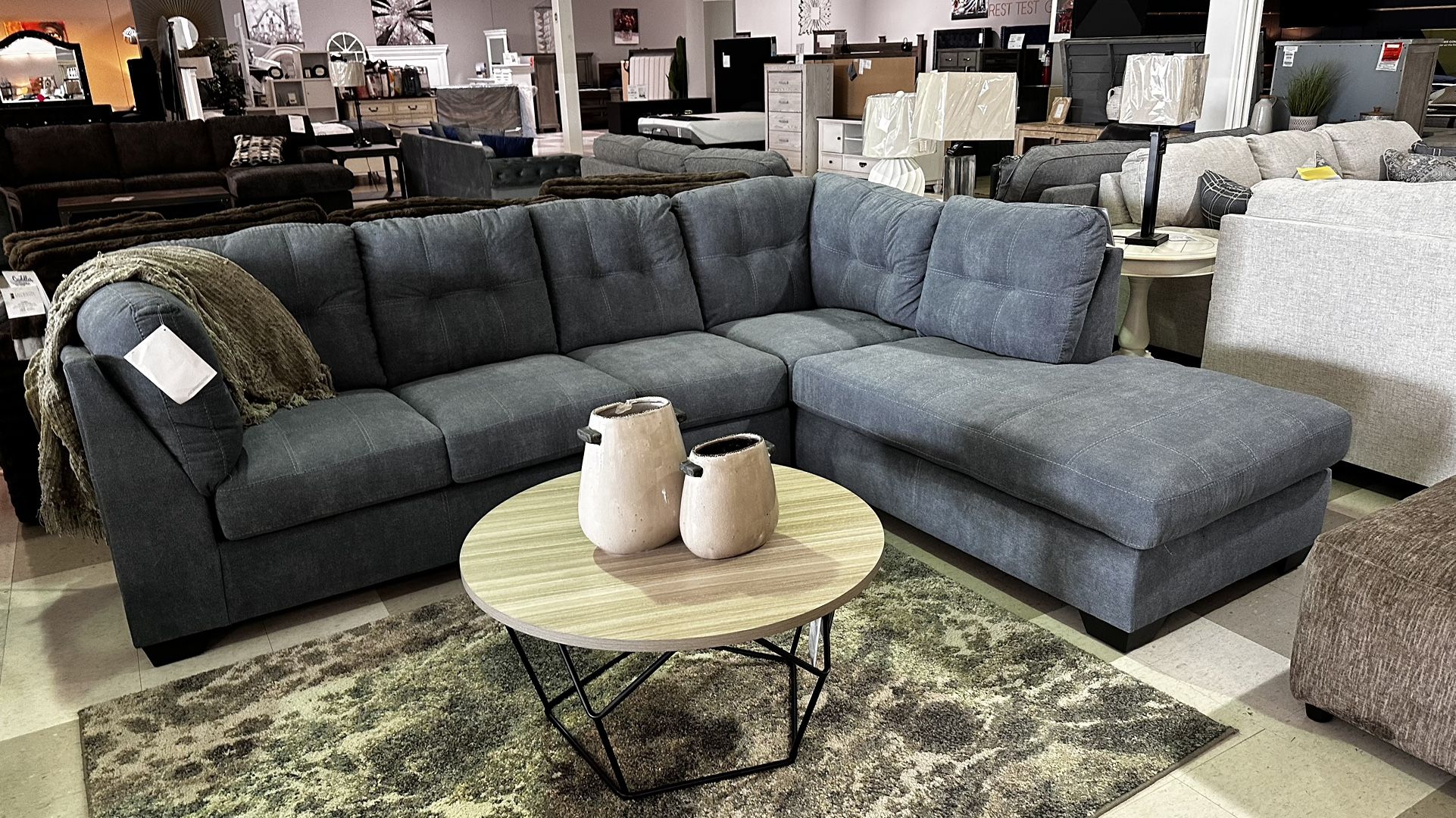 $39 down or $1229 gets this Brand New Ashley Marleton Denim Sleeper Sectional. No credit. No interest. Fast delivery!