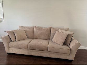 Beige corduroy sofa and loveseat set