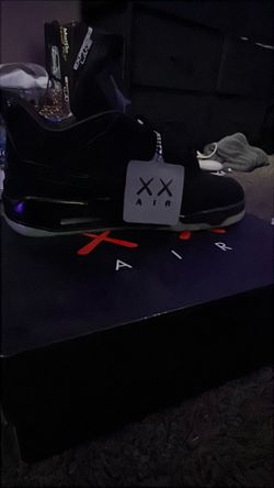Jordan 4 Kaws Black