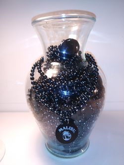 (52) Black Malibu Alcohol Advertisement New Orleans Mardi-Gras Beads/Clear Vase