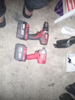 2 Milwaukee drills 2 5.0 batteries