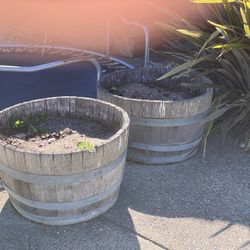 “FREE” (3) wine barrels planters