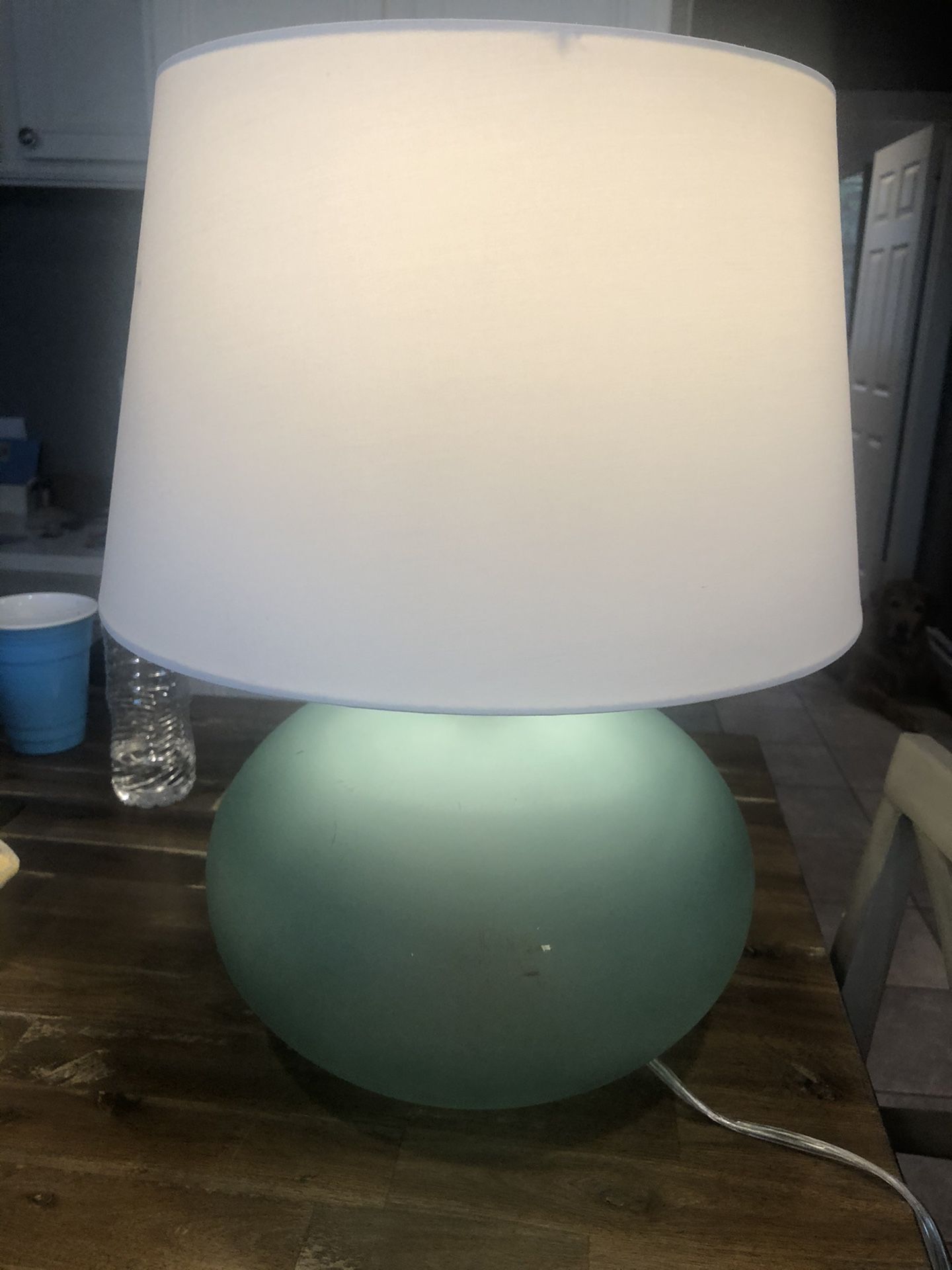 Glass base table lamp