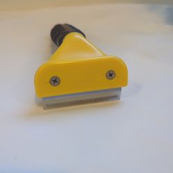 Furminator  undercoat deshedding tool small or medium dog
