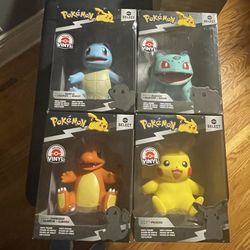4 New In Box Pokémon Deluxe Vinyl 8" Figures - Pikachu Charmander Squirtle Bulbasaur
