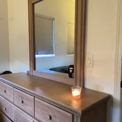 Tan dresser with mirror