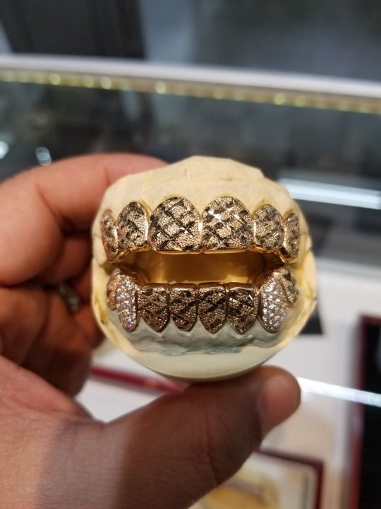 Mr bling gold teeth