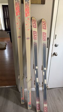 Two sets of skis only have boots for one