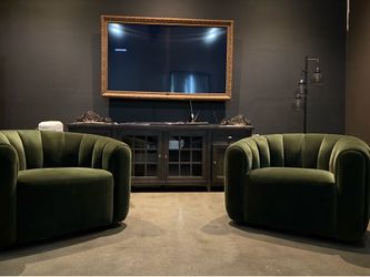 CB2 green swivel accent chair