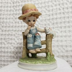 Boy and cat on a fence figurine 4"  ( On Vacation) 