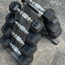SET OF RUBBER DUMBBELLS (PAIRS OF)  :   5s  10s  15s  20s   &  SMALL PYRAMID  DUMBBELL RACK
   *   *  *  will sell  pairs individually 
  