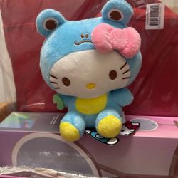 Hello kitty in Blue Frog Outfit Official merch. 