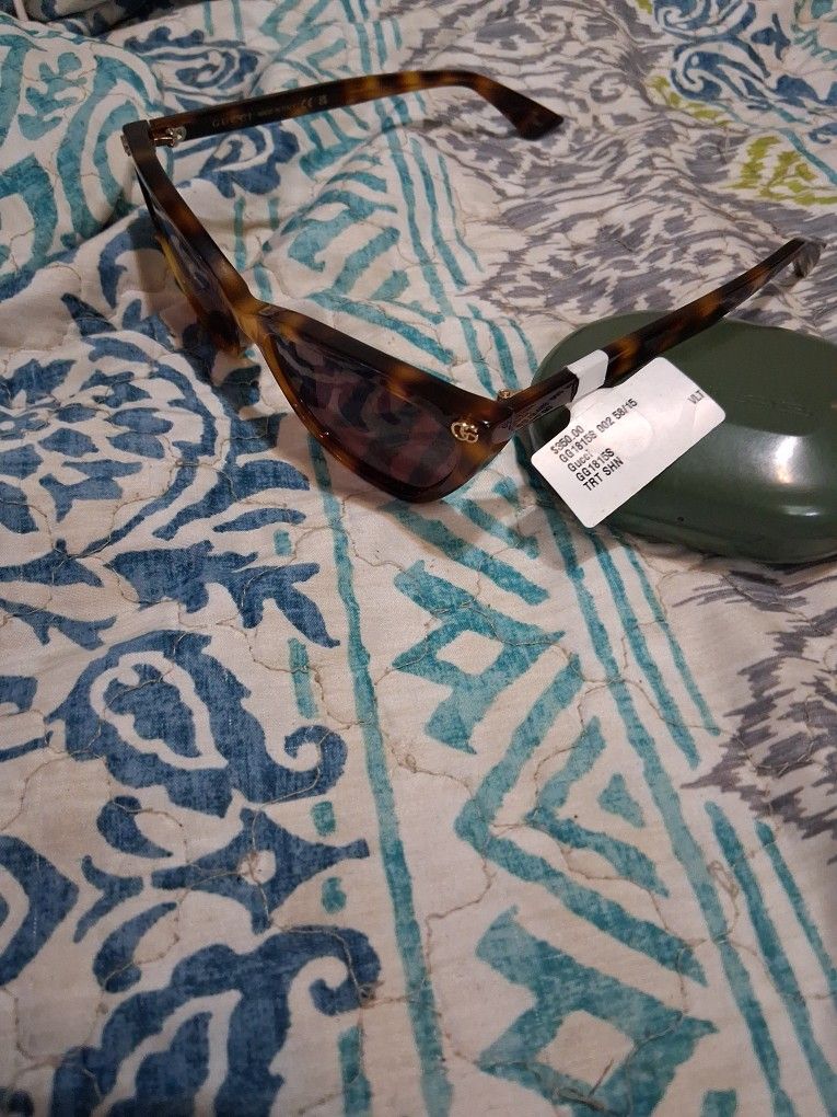 Gucci, sunglasses.\nThree hundred sevent