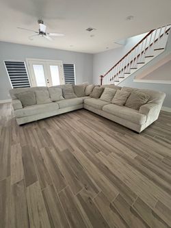 Large L-Shaped Sectional Sofa with Pillows