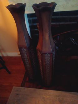 A Pair Of Dark Brown Wrought Iron Vases