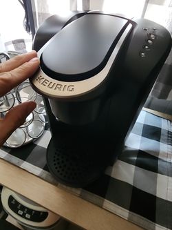 Coffee maker and pod stand