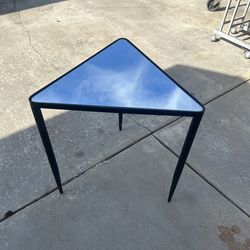 Triangular glass table