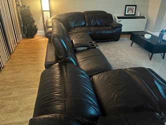 Leather sectional with reclining seats