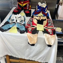 Motocross racing leathers sizes as noted $15 each for 40 bucks crawl