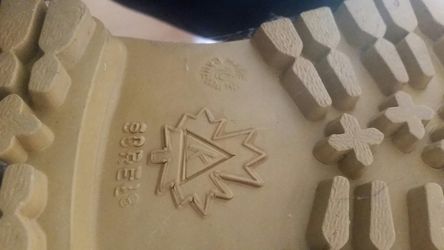 Sorel boots size 10 and black interceptor work boots size 9