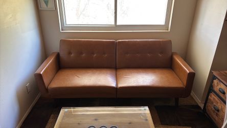 Fold out leather look vinyl murphy couch