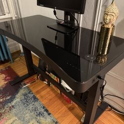 Adjustable Glass Top Table 