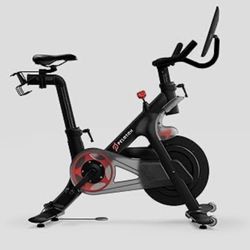 Peloton stationary Bicycle.  Includes Bonus Items.