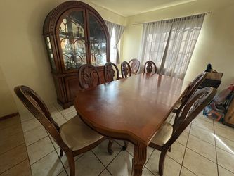 Dinning table, vitrina and chairs