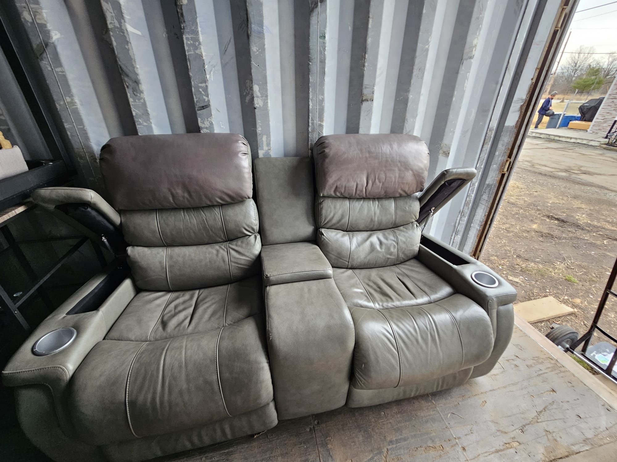 Dwyer Double Reclining Sofa with Center Drop Down Cup Holders