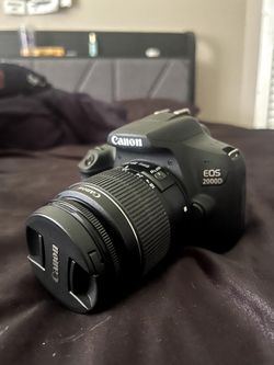 Canon EOS 2000D Camera
with Microphone & Backpack