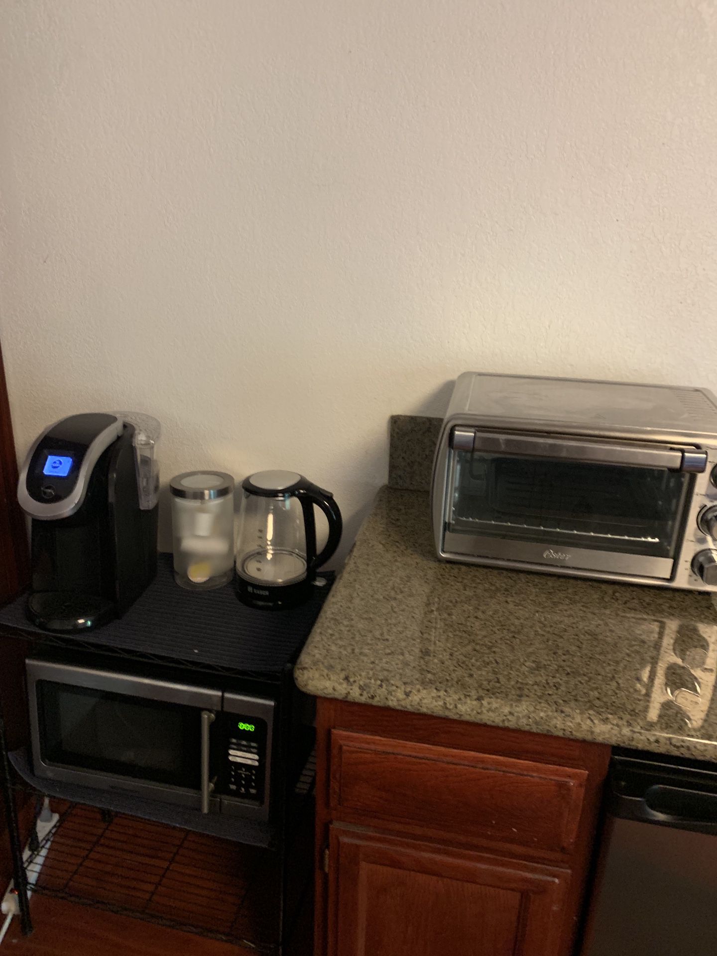 Keurig coffee maker, toaster oven, microwave and electric tea kettle