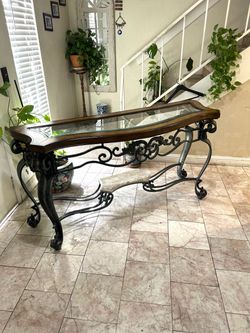 Consol iron table glass top removable  and marble in down 65” long 22” deep  34” height