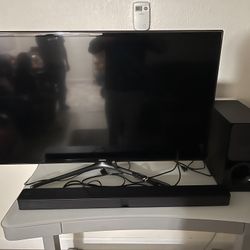Tv + Sound Bar( With Subwoofer)