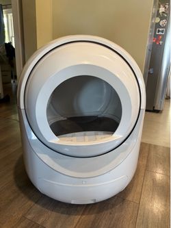 Automatic self-cleaning litter box for cats