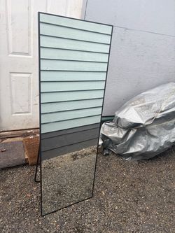 full-length standing floor mirror with metal support bracket