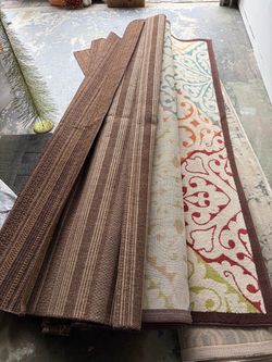Assorted indoor and indoor/outdoor area rugs