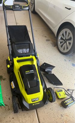 RYOBI Cordless Lawn mower With Battery And Charger (nearly New)