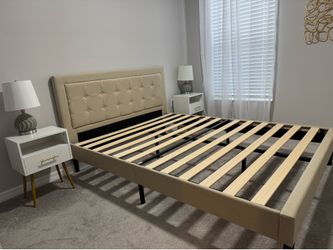Queen bed with lamp tables