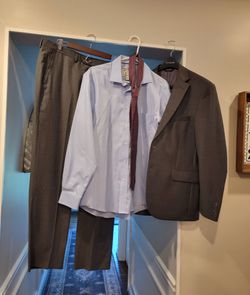 Suit, dress shirt, and tie