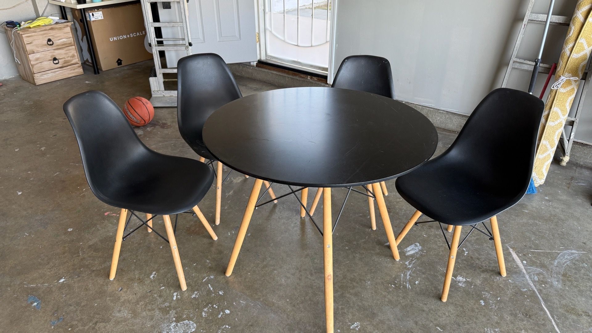 Round table with four (4) chairs