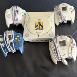 Dreamcast Bundle With 4 Controllers And 8 Games