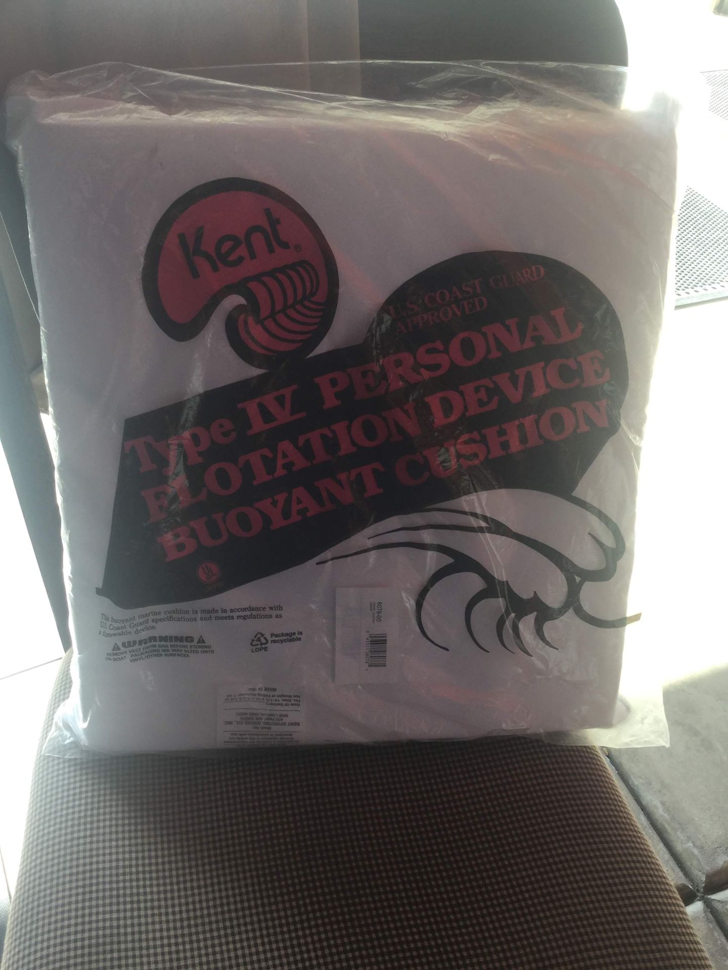 Type IV Personal Floatation Device by Kent. This is a buoyancy cushion approved by US Coast Guard. 15.5” by 14.5” by 2.5”.  Brand New